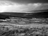 Strathoykel. Poem by Dave Goulder. He reaches for another stone / Turns and bends, back to the wind to place it...